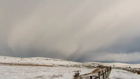 Aerial Vision NI Snow showers blowing near the Glenshane Pass