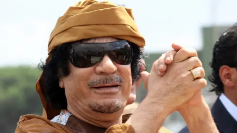 AFP Libyan leader Muammar Gaddafi