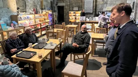 BBC Mr Mather chats with Janet and Brian Rogerson (left) at Selby Abbey