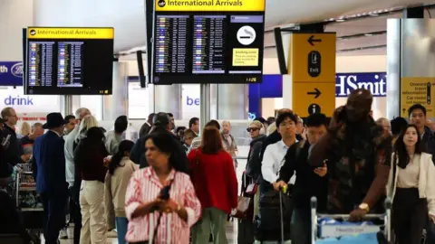 Shutterstock Passengers in an airport