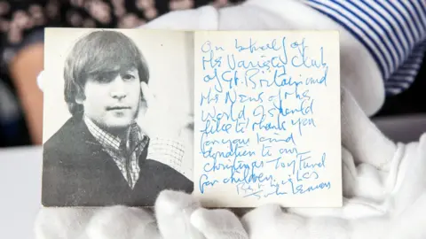 The Beatles Story Signed postcard