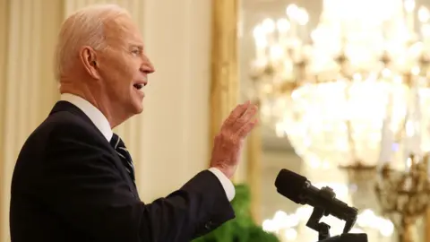 Getty Images President Biden speaking at press conference