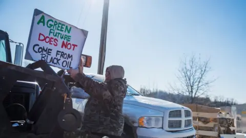 Reuters First Nations members of the Tyendinaga Mohawk Territory block train tracks servicing Via Rail