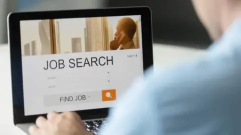 Getty Images Searching for a job online