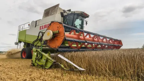 NurPhoto / Getty A tractor
