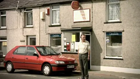 Noel Thomas outside the Post Office when he was sub-postmaster