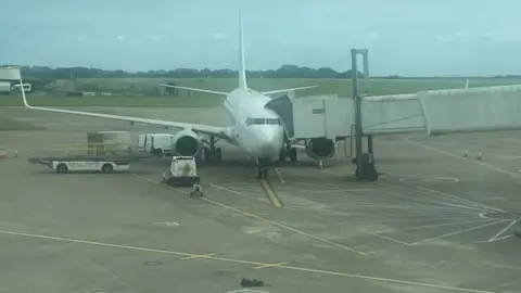 Daniel Hopkins At Cardiff Airport Daniel Hopkins was waiting to board a flight to Tenerife
