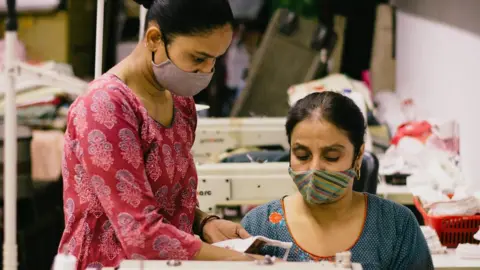 Rohan Doshi Rehat Rangrez, left, with a colleague
