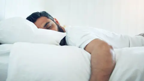 Getty Images Man in bed
