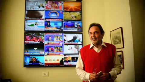 Getty Images Prannoy Roy, Co-founder and Executive Co-Chairperson of New Delhi Television (NDTV), poses for a profile shoot during an interview at his office on March 14, 2014