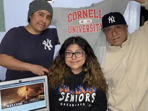 Ana  Carmona Ana with her parents accepts Cornell