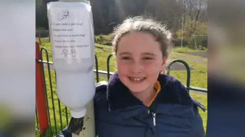 Family photo Sofia with the dispenser