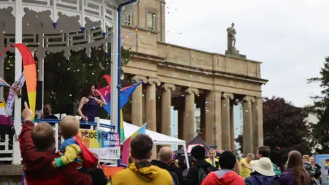 Hexe Digital Crowds enjoying Pride in the Park in Cheltenham's Pittville park in 2022