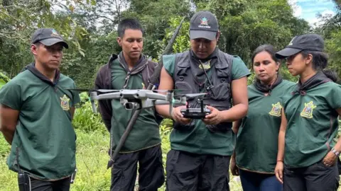 Goldman Environmental Prize Members of La Guardia, the indigenous guard, use a drone