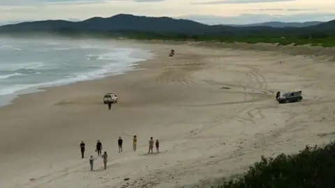 Reuters The aftermath of a shark attack at Wooli Beach in New South Wales, Australia, 11 July 2020