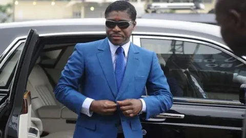 AFP File photo taken on 24 June 2013 shows Teodoro (aka Teodorin) Nguema Obiang, son of Equatorial Guinea president, arriving at Malabo stadium