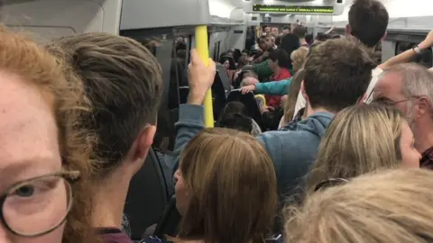 Lousie Kerr Overcrowded train