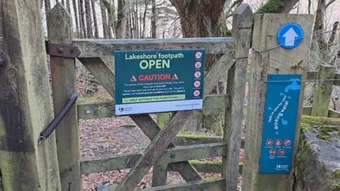 UNITED UTILITIES Footpath signage showing path has reopened