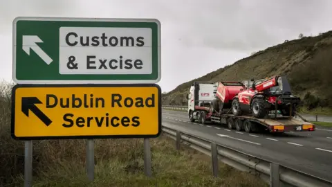 PA A sign for a customs stop near the Irish border