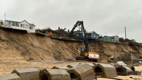 Andrew Turner/BBC The high reach grab working from the beach