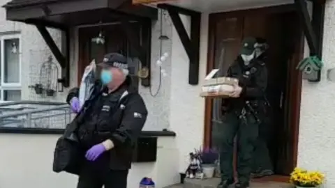 NCA NCA officers on a raid