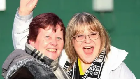 Iris Smith Iris Smith (right) with a friend