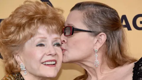 Getty Images Debbie Reynolds and Carrie Fisher