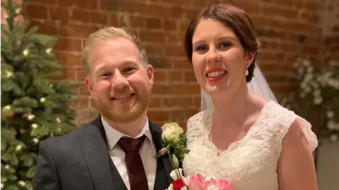 Sam and Hannah Freeman on their wedding day