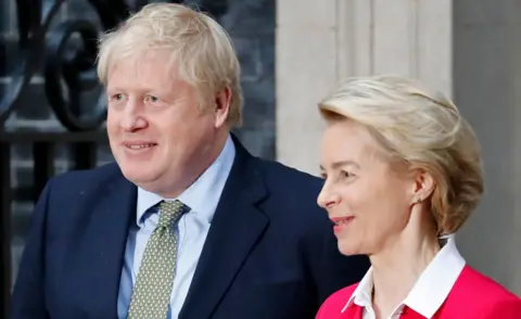 AFP Boris Johnson and Ursula von der Leyen pose outside 10 Downing Street on 8 Jan 2020