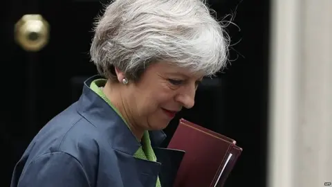 AFP Theresa May leaves Downing Street