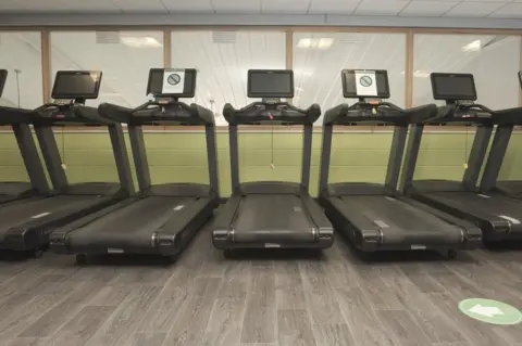 BBC Empty treadmills inside Clacton Leisure Centre's gymnasium