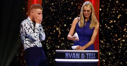 Tom Dymond A contestant with Tess Daly on Game of Talents