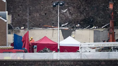 PA Media Fatal explosion in Pier Road, Jersey