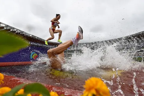 Ben Stansall Germany's Lea Meyer (right) competes in the women's 3000m steeplechase heats during the World Athletics Championships at Hayward Field in Eugene, Oregon, 16 July 2022