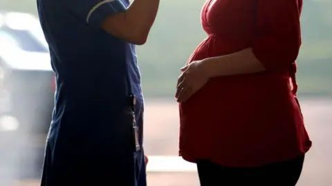 PA Media Anonymous nurse and expectant mum