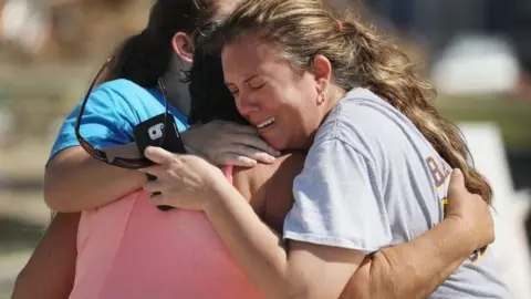 Getty Images Residents of Mexico Beach return to find homes heavily damaged following Hurricane Michael, 11 October 2018