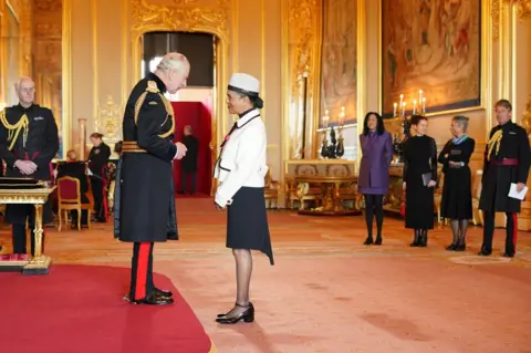 PA Media King Charles and Pauline Black