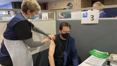 HEC Ltd 2021/PA Wire Shakin' Stevens receiving coronavirus vaccine