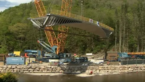 BBC The bridge being lifted into place