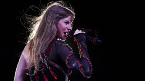 Getty Images Taylor Swift on stage in Argentina