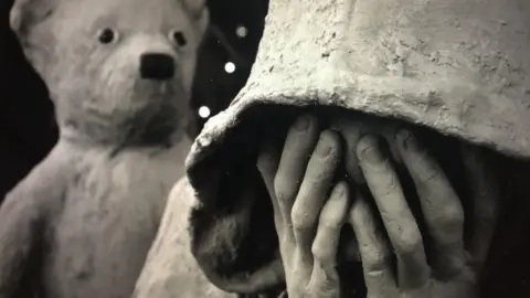 @gettinguptostuff instagram close up of the bear with me statue