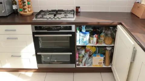 Wiltshire Police Kitchen and cupboard where Emile Cilliers opened the gas valve