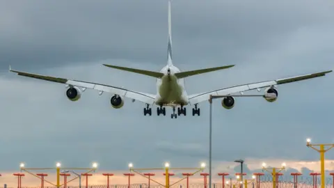 Getty Images plane coming in to land