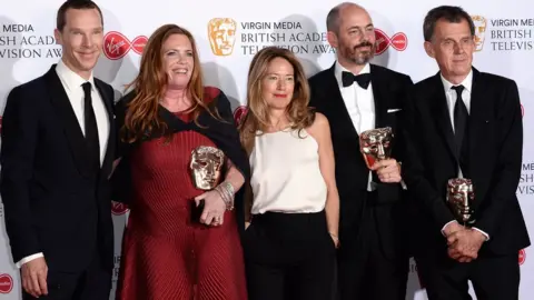 Getty Images Benedict Cumberbatch (left) and winners of the mini-series award for Patrick Melrose