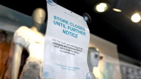 PA Media Primark closed sign