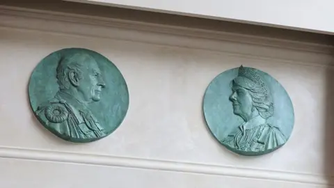 Pool Bronze reliefs of King Charles and Queen Camilla