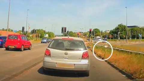 South Gloucestershire Council Someone littering out of a car