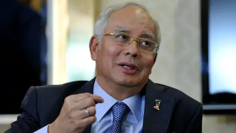 Getty Images Malaysian Prime Minister Najib Razak speaks at a news conference in Kuala Lumpur on 7 May 2013.