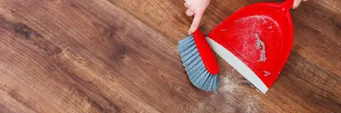 Getty Images Dustpan and brush