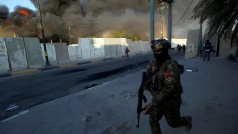 Reuters A soldier runs